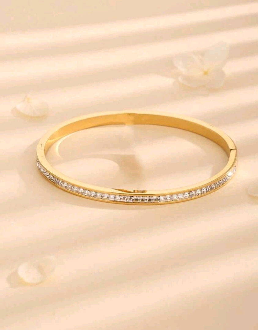 Bransoletka złota sztywna z cyrkoniami bangle
