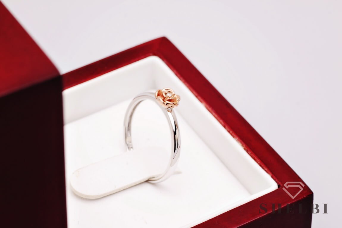 Złoty pierścionek z brylantem białe i różowe złoto Staviori