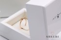 Złoty pierścionek kokardka z brylantem różowe złoto Staviori