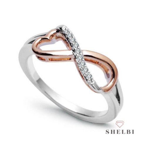 Złoty pierścionek nieskończoność z brylantami białe i różowe złoto Staviori