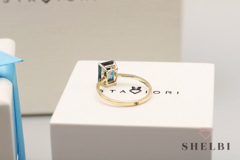 Złoty pierścionek z topazem i diamentami pr. 585 r. 18 Złoty pierścionek z topazem i diamentami pr. 585 r. 18