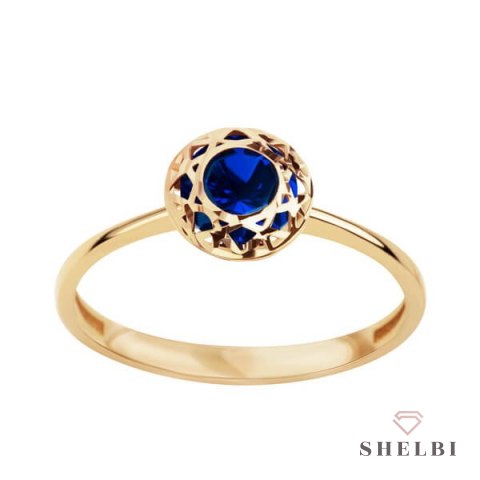 Złoty pierścionek z niebieską cyrkonią w ażurowej oprawie żółte złoto Staviori