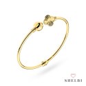 Bransoletka złota sztywna z gładką kulką i diamentowaną koniczynką 585 SHELBI