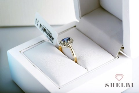 Złoty pierścionek szafir i diamenty pr. 585 białe i żółte złoto Złoty pierścionek szafir i diamenty pr. 585 białe i żółte złoto
